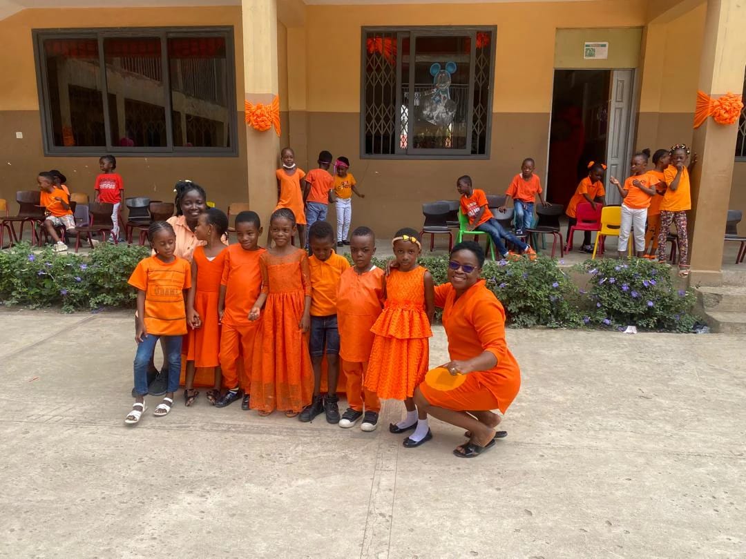 Divine International School pupils celebrating colour day community.